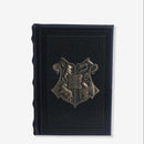 CADERNO DE ANOTAÇÕES C/APLIQUE BRASAO METAL HOGWARTS