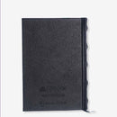 CADERNO DE ANOTAÇÕES C/APLIQUE BRASAO METAL HOGWARTS